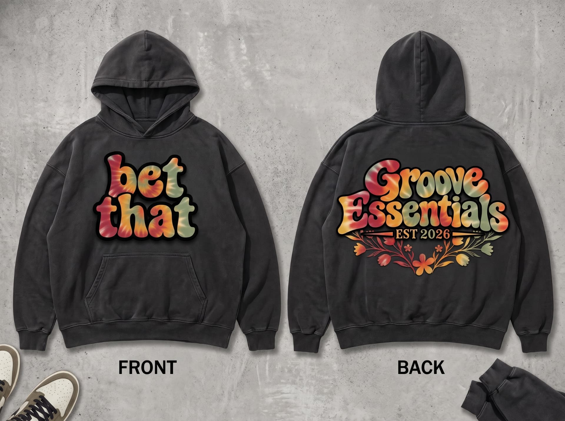 Bet That hoodie mockup in washed charcoal, front with tie-dye bubble lettering and back with Groove Essentials EST 2026 floral graphic